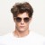 Okulary unisex z pomarańczowymi oprawkami Meller Kubu Bone Grey